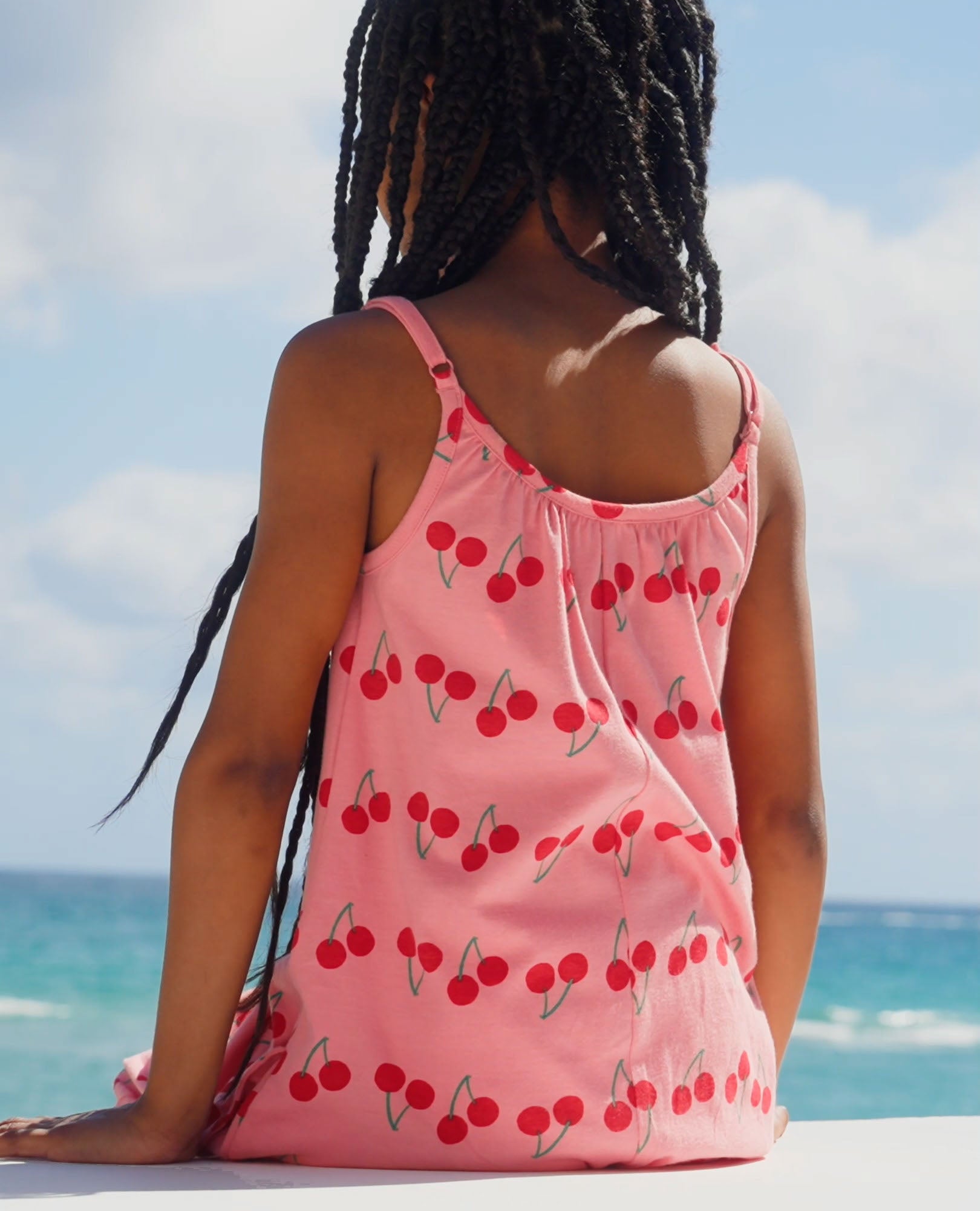 Video of child wearing Sleeveless Romper with Pockets