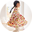 girl twirling in floral dress